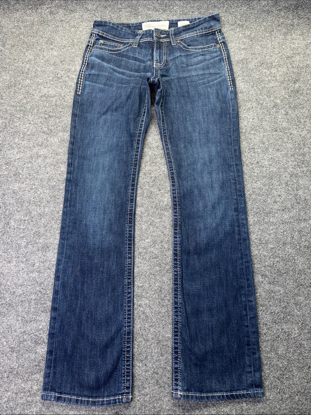 BKE Payton Boot Cut Mid-Rise Women’s Jeans in Dark Blue Denim. 28L